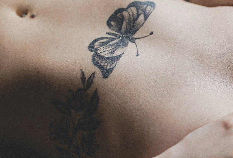 pleasepinchmehard butterfly tattoo on a woman - a short erotic story about two females and squirting