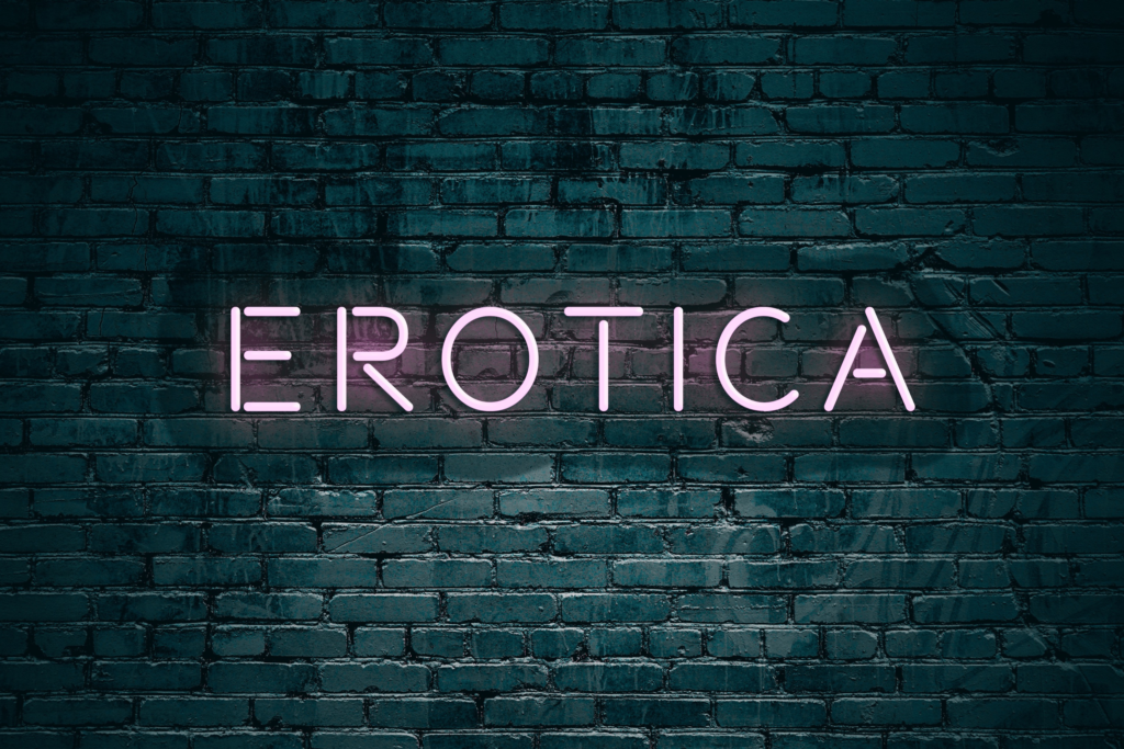 A photo of a black wall with the word EROTICA in pink, neon writing as lights