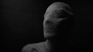Photo of Lisa Opel wearing a mask for the article Degradation Kink
